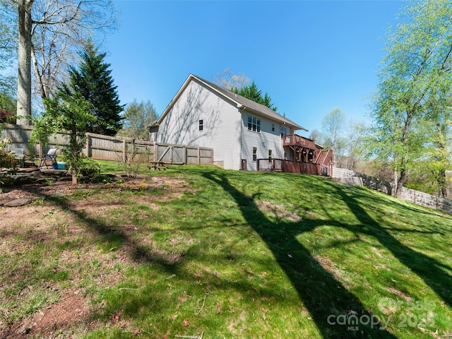 18 Birdsong Ln, Candler, NC 28715 - view of yard with stairway, a fenced backyard, and a deck