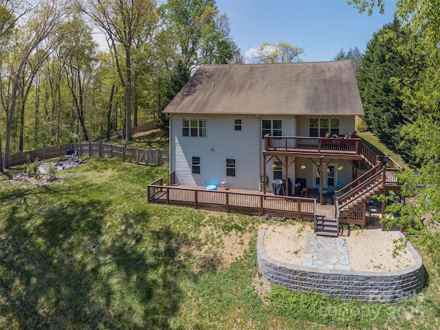 18 Birdsong Ln, Candler, NC 28715 - rear view of property featuring a fenced backyard, stairway, a deck, a yard, and a patio