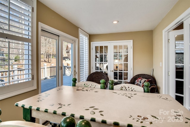dining space featuring recessed lighting