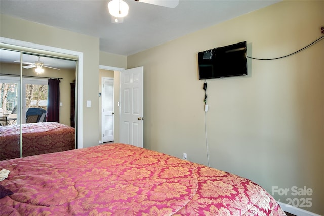 bedroom with a closet and a ceiling fan