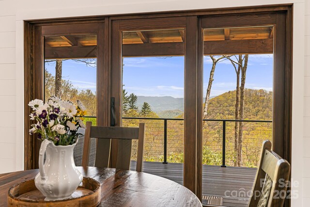 dining room with a mountain view