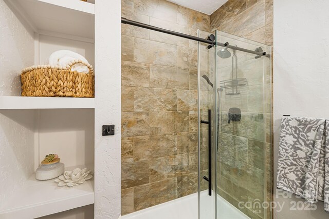 full bathroom with a stall shower