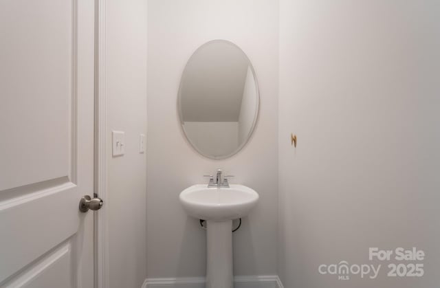 bathroom featuring baseboards