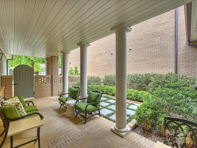 2616 Colton Dr, Charlotte, NC 28211 - view of patio featuring covered porch and a gate