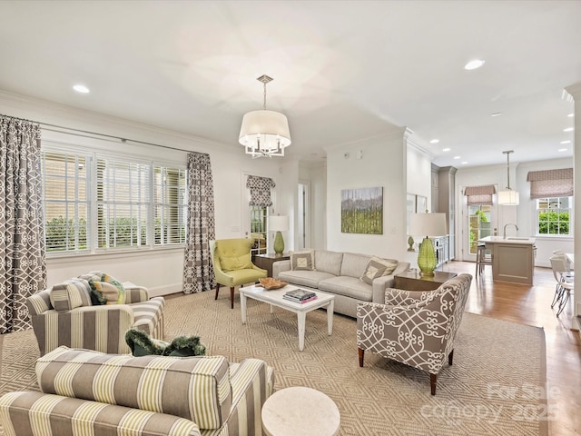 2616 Colton Dr, Charlotte, NC 28211 - living room featuring a chandelier, light wood-type flooring, baseboards, and recessed lighting