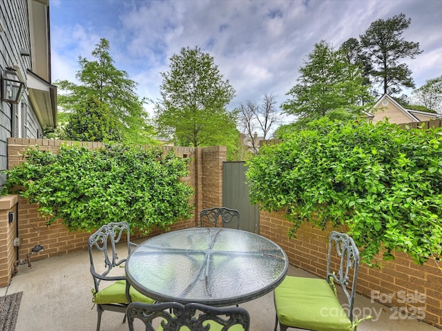 2616 Colton Dr, Charlotte, NC 28211 - view of patio with outdoor dining space and fence