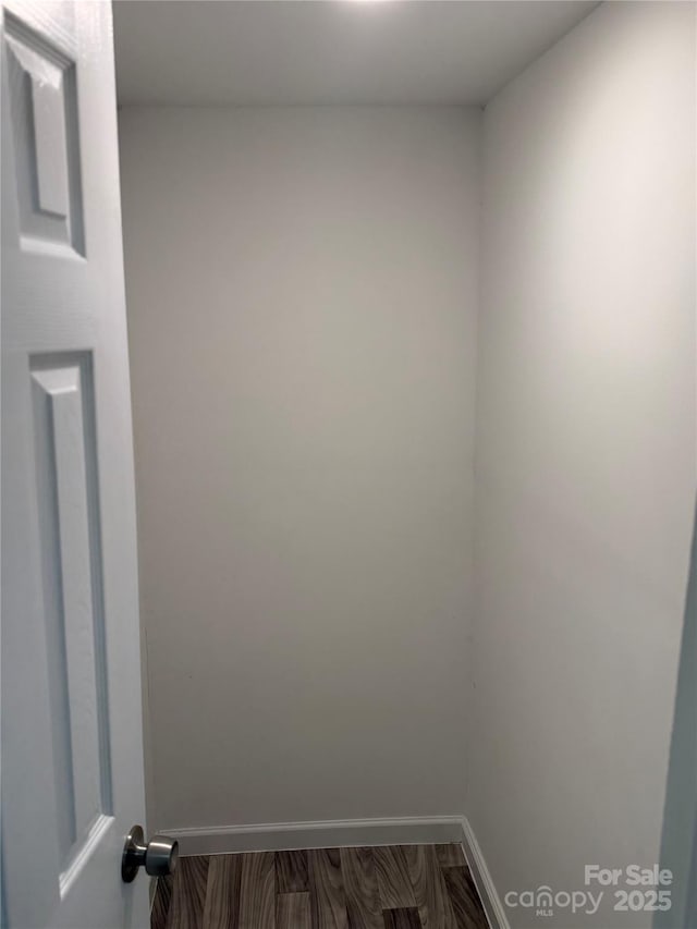 empty room with baseboards