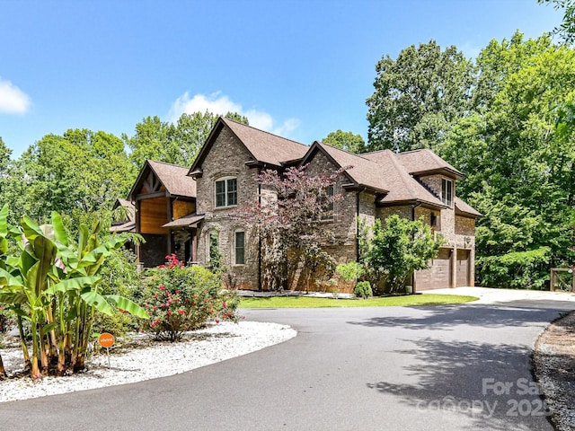 633 Elmhurst Dr, Fort Mill, SC 29715 - view of front of home with an attached garage, driveway, and brick siding