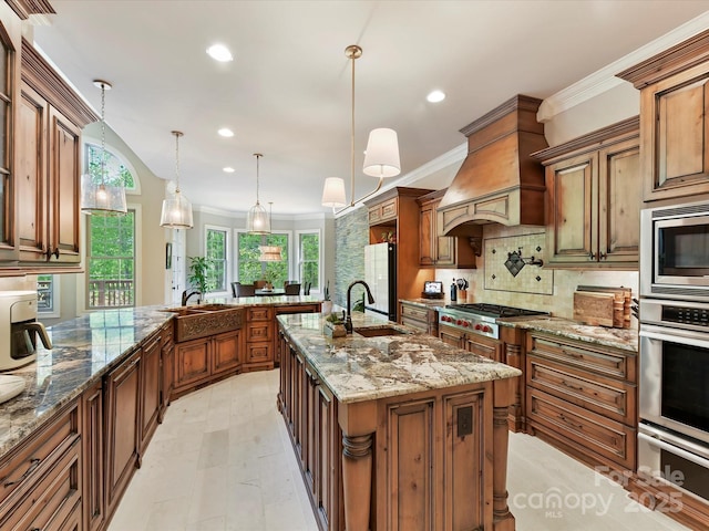 633 Elmhurst Dr, Fort Mill, SC 29715 - kitchen with stainless steel appliances, a sink, recessed lighting, light stone countertops, and tasteful backsplash