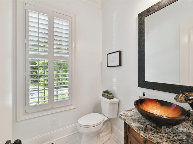 633 Elmhurst Dr, Fort Mill, SC 29715 - bathroom featuring baseboards, plenty of natural light, toilet, and vanity