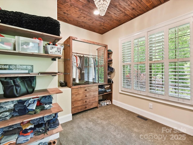 633 Elmhurst Dr, Fort Mill, SC 29715 - walk in closet featuring carpet and a chandelier