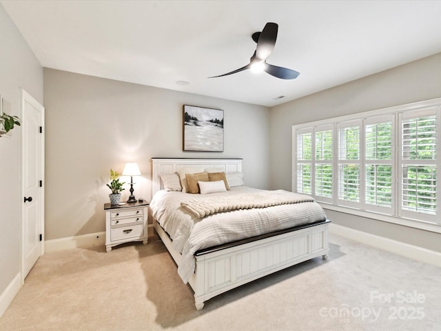 633 Elmhurst Dr, Fort Mill, SC 29715 - bedroom featuring light colored carpet, baseboards, and a ceiling fan