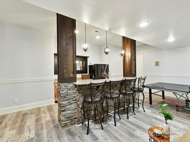 633 Elmhurst Dr, Fort Mill, SC 29715 - indoor bar with freestanding refrigerator, light wood-style floors, baseboards, hanging light fixtures, and recessed lighting