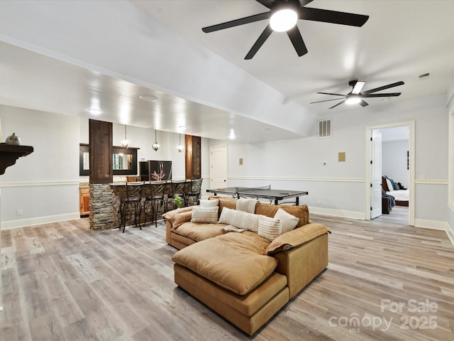 633 Elmhurst Dr, Fort Mill, SC 29715 - living room featuring ceiling fan, light wood-style floors, vaulted ceiling, and baseboards