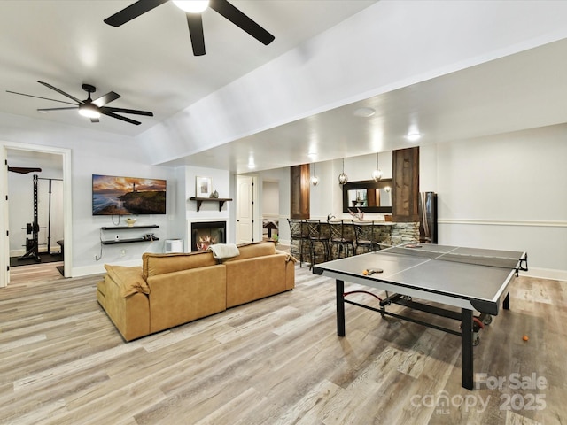 633 Elmhurst Dr, Fort Mill, SC 29715 - rec room with light wood finished floors, ceiling fan, and baseboards