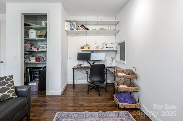office area featuring wood finished floors and baseboards