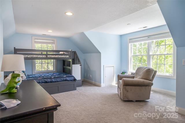 carpeted bedroom featuring vaulted ceiling, baseboards, and recessed lighting