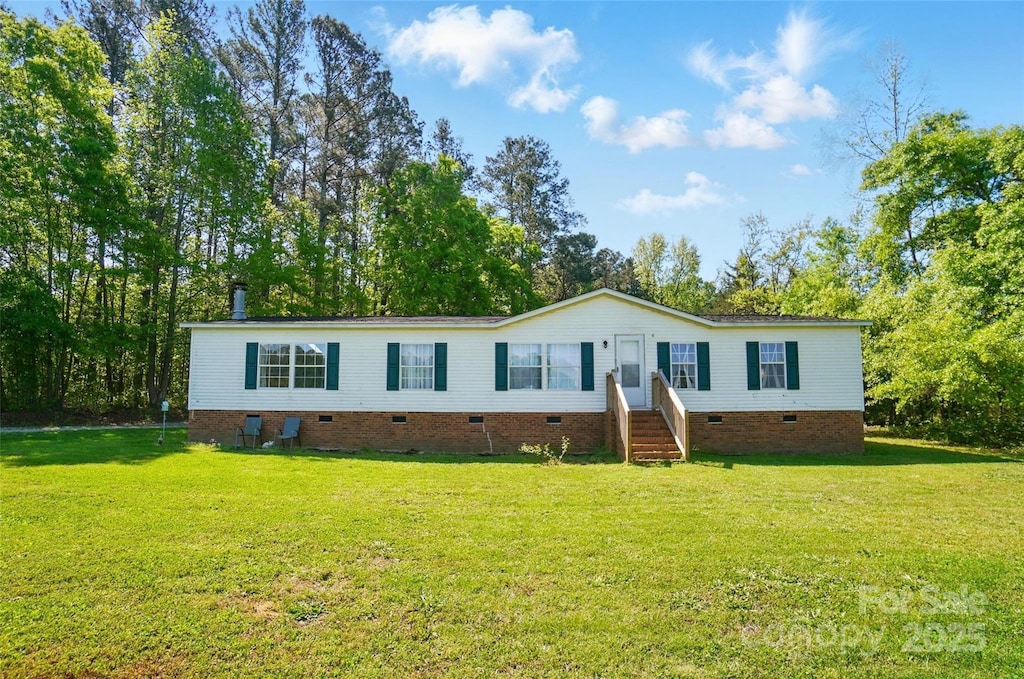 3678 Old Camden Hwy, Heath Springs, SC 29058 - manufactured / mobile home with a front yard, entry steps, and crawl space