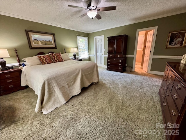 271 Ikerd Dr SE, Concord, NC 28025 - bedroom with ornamental molding, light carpet, ensuite bathroom, a textured ceiling, and a ceiling fan