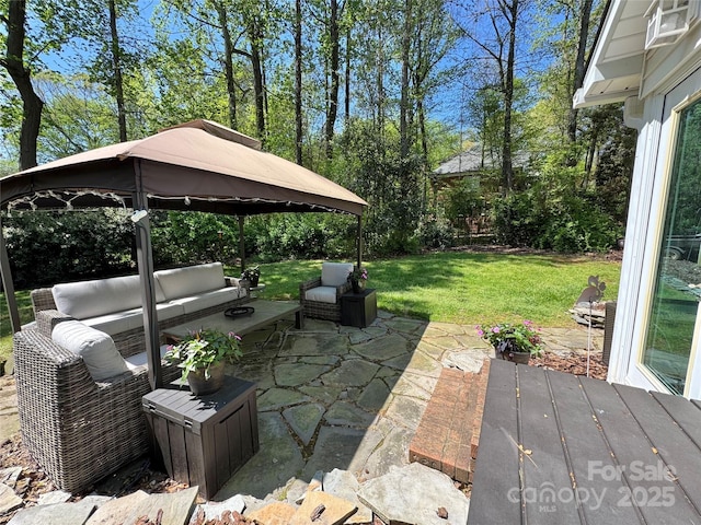 271 Ikerd Dr SE, Concord, NC 28025 - view of patio / terrace with a gazebo and an outdoor hangout area