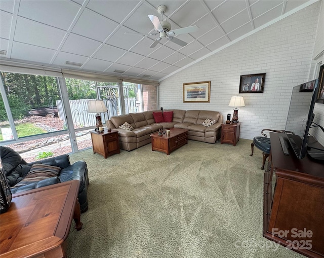 271 Ikerd Dr SE, Concord, NC 28025 - living area featuring brick wall, light carpet, and ceiling fan