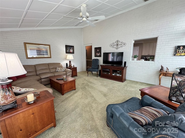 271 Ikerd Dr SE, Concord, NC 28025 - living room with carpet floors, ceiling fan, and brick wall