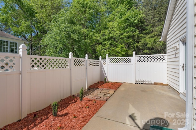 view of patio featuring a fenced backyard