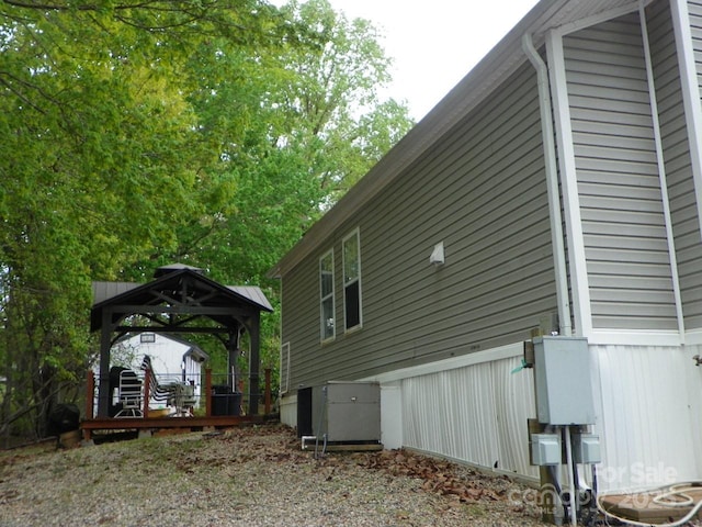 view of home's exterior featuring a gazebo