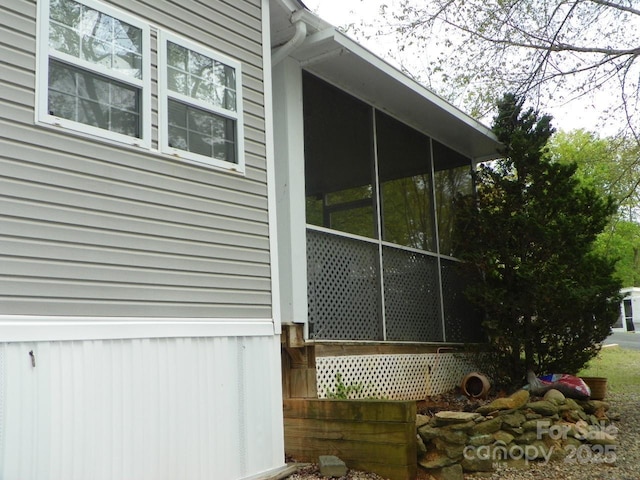 view of home's exterior featuring a sunroom