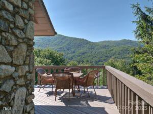 16 Ridgeview Dr, Asheville, NC 28804 - deck featuring a mountain view and outdoor dining area