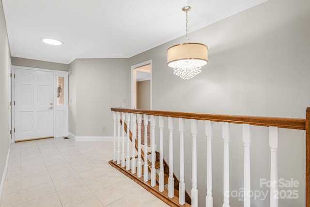 16 Ridgeview Dr, Asheville, NC 28804 - hall featuring crown molding, light tile patterned floors, baseboards, an upstairs landing, and a chandelier