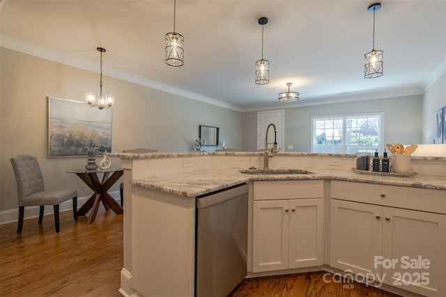 439 Beacon St NW, Concord, NC 28027 - kitchen with wood finished floors, dishwasher, a sink, and ornamental molding