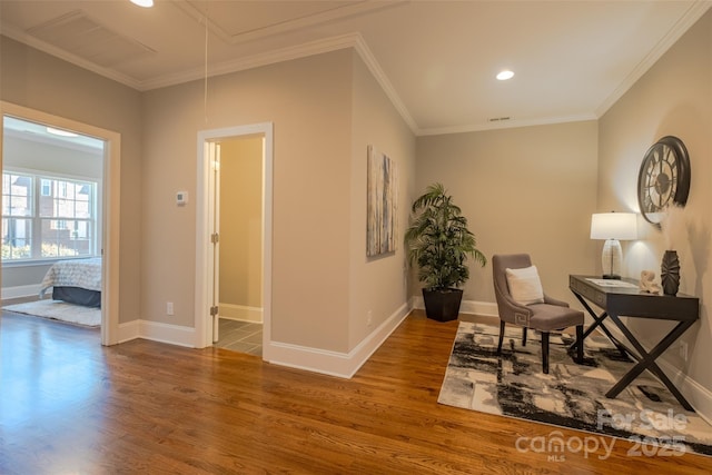 439 Beacon St NW, Concord, NC 28027 - sitting room with baseboards, crown molding, recessed lighting, attic access, and wood finished floors