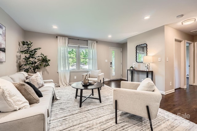 living room with baseboards, dark wood-style flooring, and recessed lighting