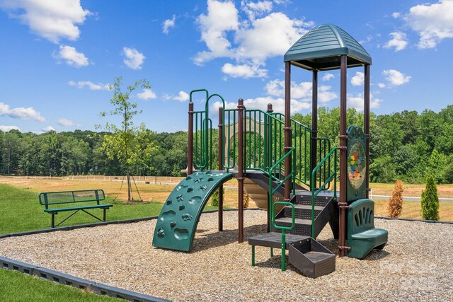 communal playground with a lawn