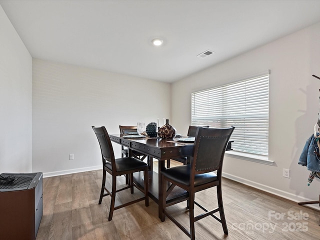 479 Daniel Dr, Lexington, NC 27295 - dining space with wood finished floors, baseboards, and visible vents