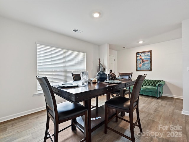 479 Daniel Dr, Lexington, NC 27295 - dining space with visible vents, baseboards, recessed lighting, and light wood-style floors