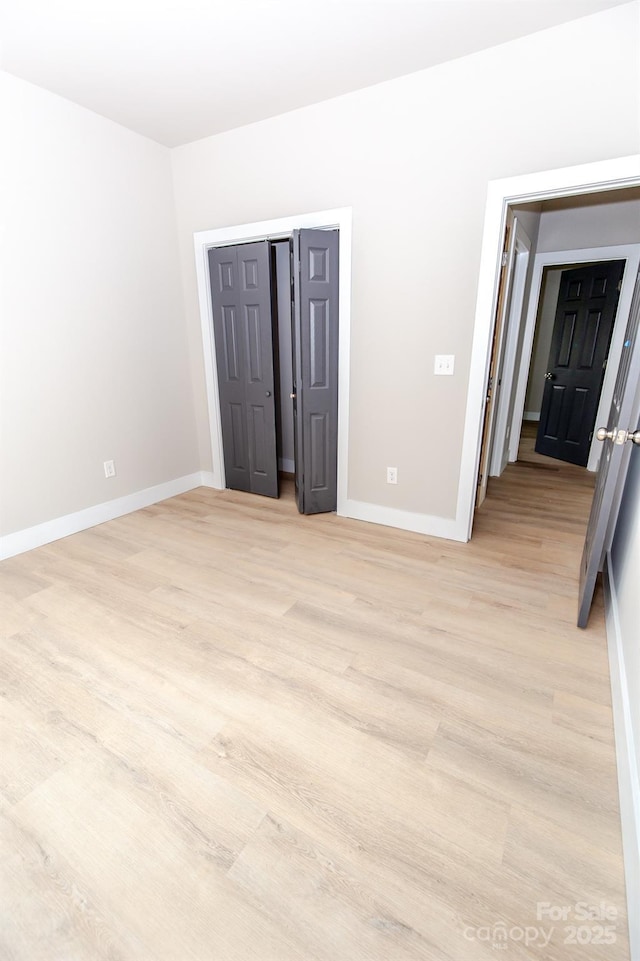 2350 14th Street Ct NE, Hickory, NC 28601 - unfurnished room featuring light wood-type flooring and baseboards