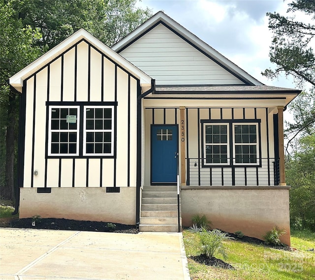2350 14th Street Ct NE, Hickory, NC 28601 - view of front of house featuring board and batten siding and a porch
