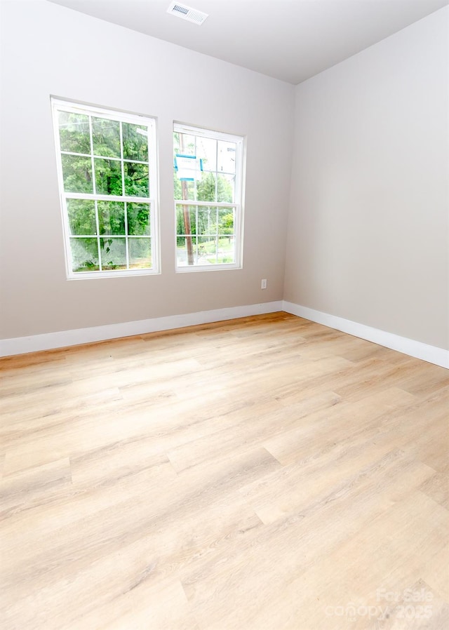 2350 14th Street Ct NE, Hickory, NC 28601 - spare room with light wood-style flooring and baseboards