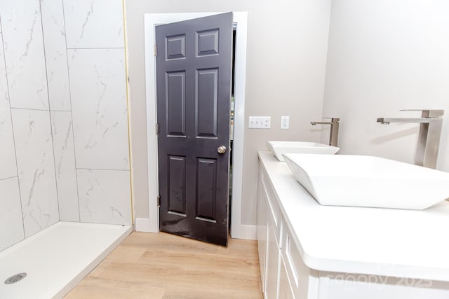 2350 14th Street Ct NE, Hickory, NC 28601 - bathroom featuring wood finished floors and a shower