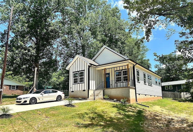 2350 14th Street Ct NE, Hickory, NC 28601 - view of front of property featuring board and batten siding, crawl space, and covered porch