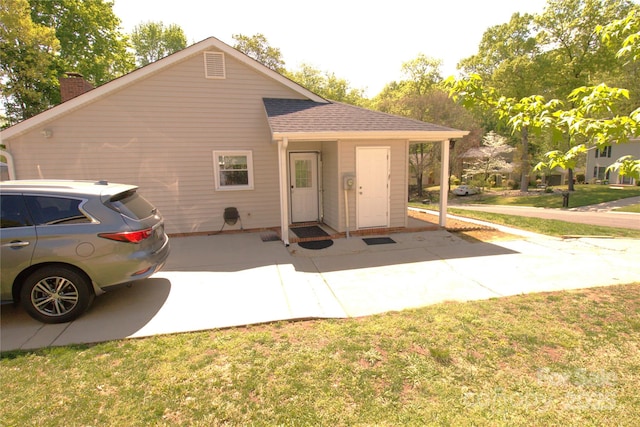 7428 Beaufort Cir, Charlotte, NC 28227 - exterior space with a chimney and a lawn