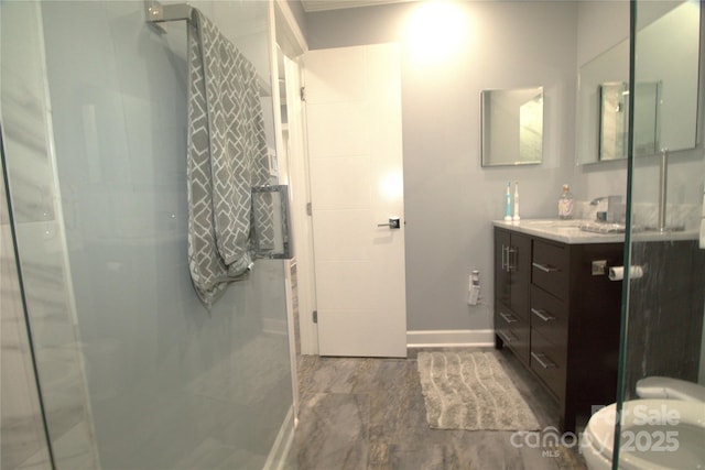 7428 Beaufort Cir, Charlotte, NC 28227 - bathroom featuring baseboards, a shower stall, and vanity