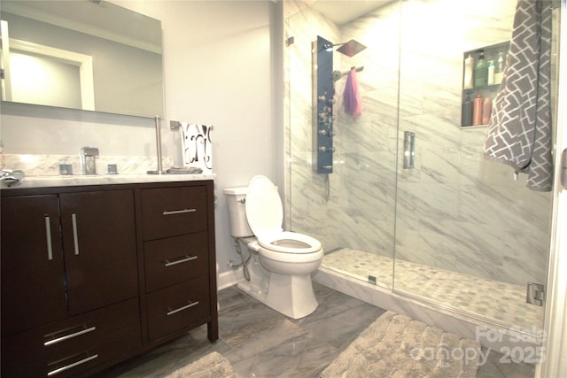 7428 Beaufort Cir, Charlotte, NC 28227 - bathroom with baseboards, toilet, crown molding, vanity, and a marble finish shower