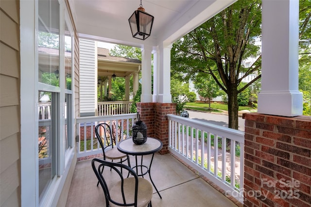 balcony featuring covered porch