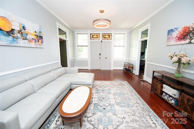 447 N Washington St, Rutherfordton, NC 28139 - living room featuring wood finished floors, baseboards, and ornamental molding