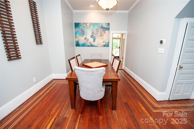 447 N Washington St, Rutherfordton, NC 28139 - dining room with crown molding, wood finished floors, and baseboards