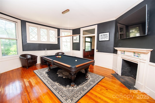447 N Washington St, Rutherfordton, NC 28139 - recreation room featuring crown molding, a fireplace with flush hearth, a wainscoted wall, hardwood / wood-style floors, and pool table