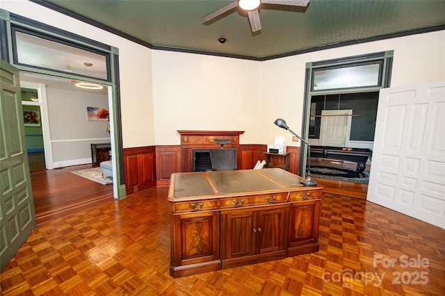 447 N Washington St, Rutherfordton, NC 28139 - office featuring a fireplace, crown molding, a wainscoted wall, and ceiling fan